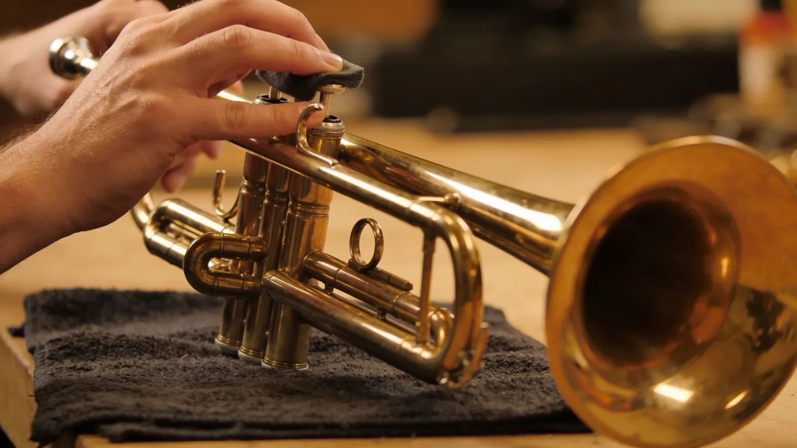 Direct the brass sound in plain English