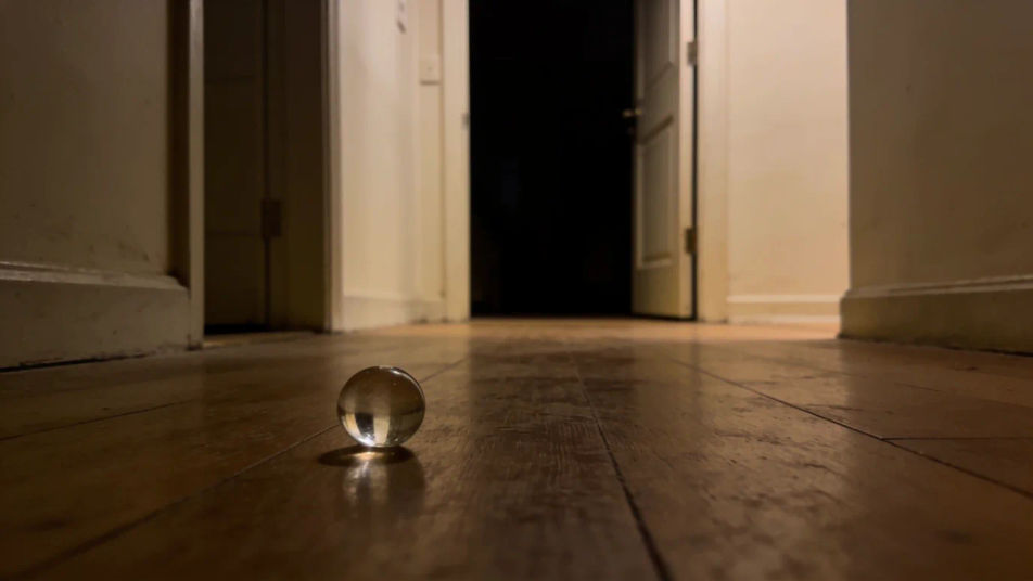 Hint at something rolling across the floor