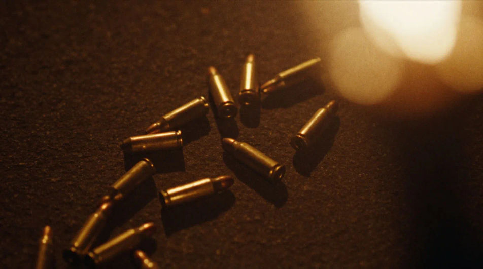 Show the aftermath of a gunfight on the ground