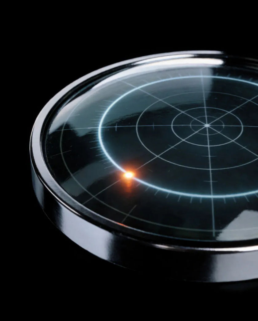 A thin ring of pale light sweeping across a dark radar screen, a single bright blip glowing where it lands