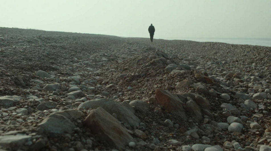 Place the story on a pebble beach