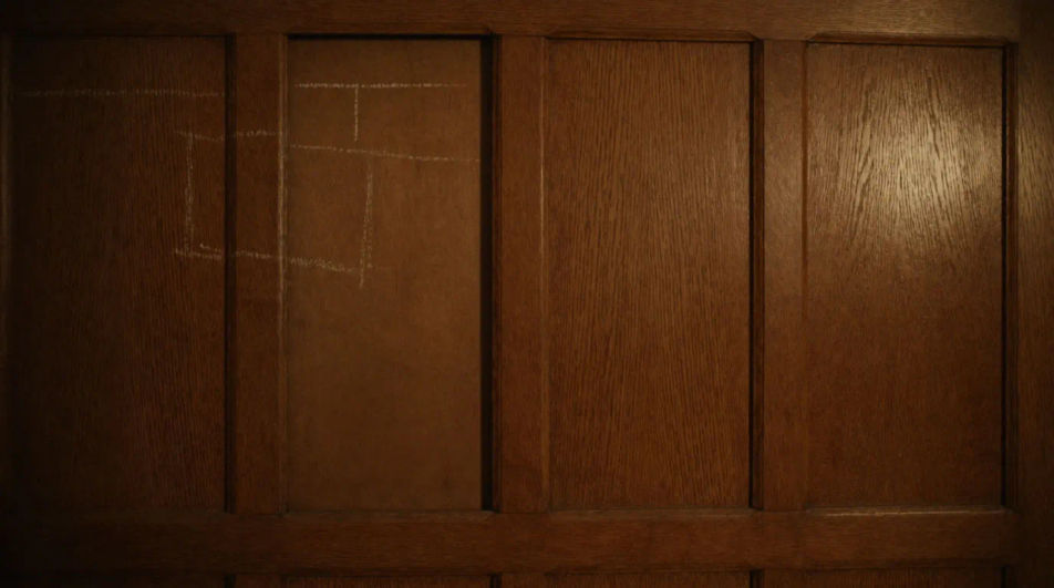 Hint at a hidden room behind a surface