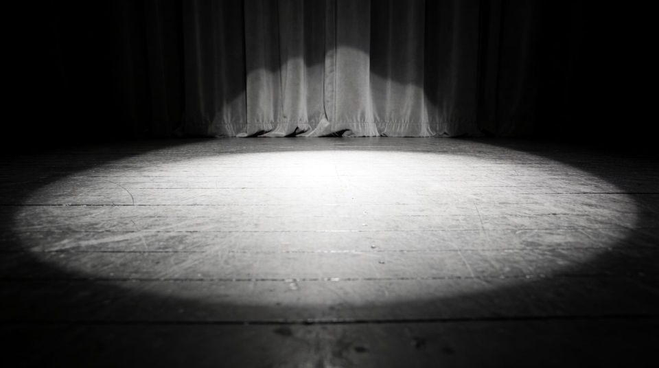 Imply a stage and an audience you never show
