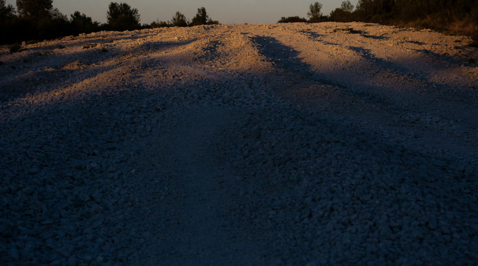 Let a distant bleat hold a quiet hillside shot