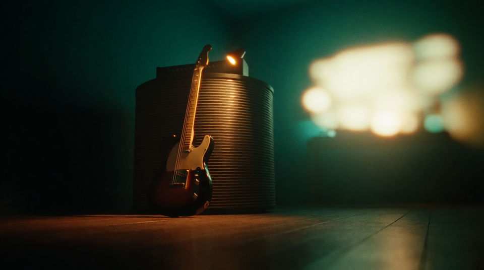 A band rehearsing somewhere off camera
