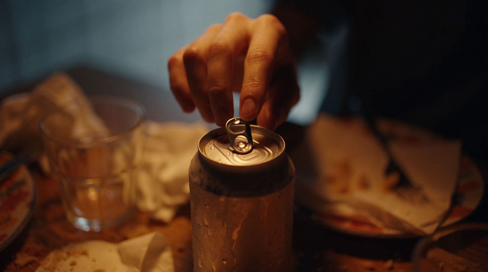 Crack the can on camera