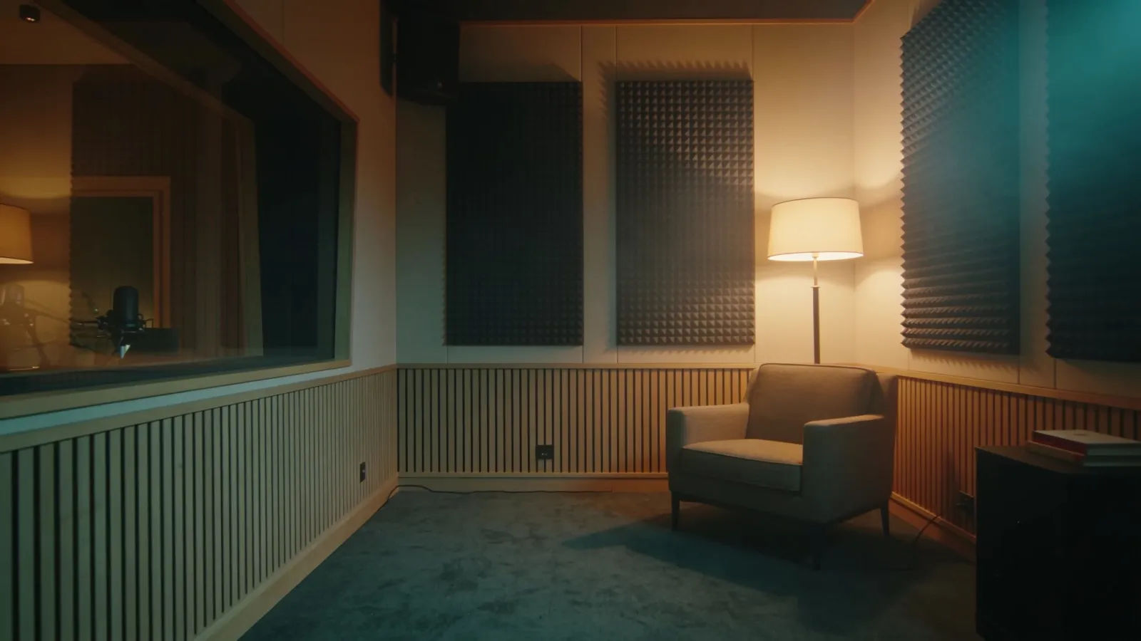 Warm modern audiobook and voiceover studio lounge