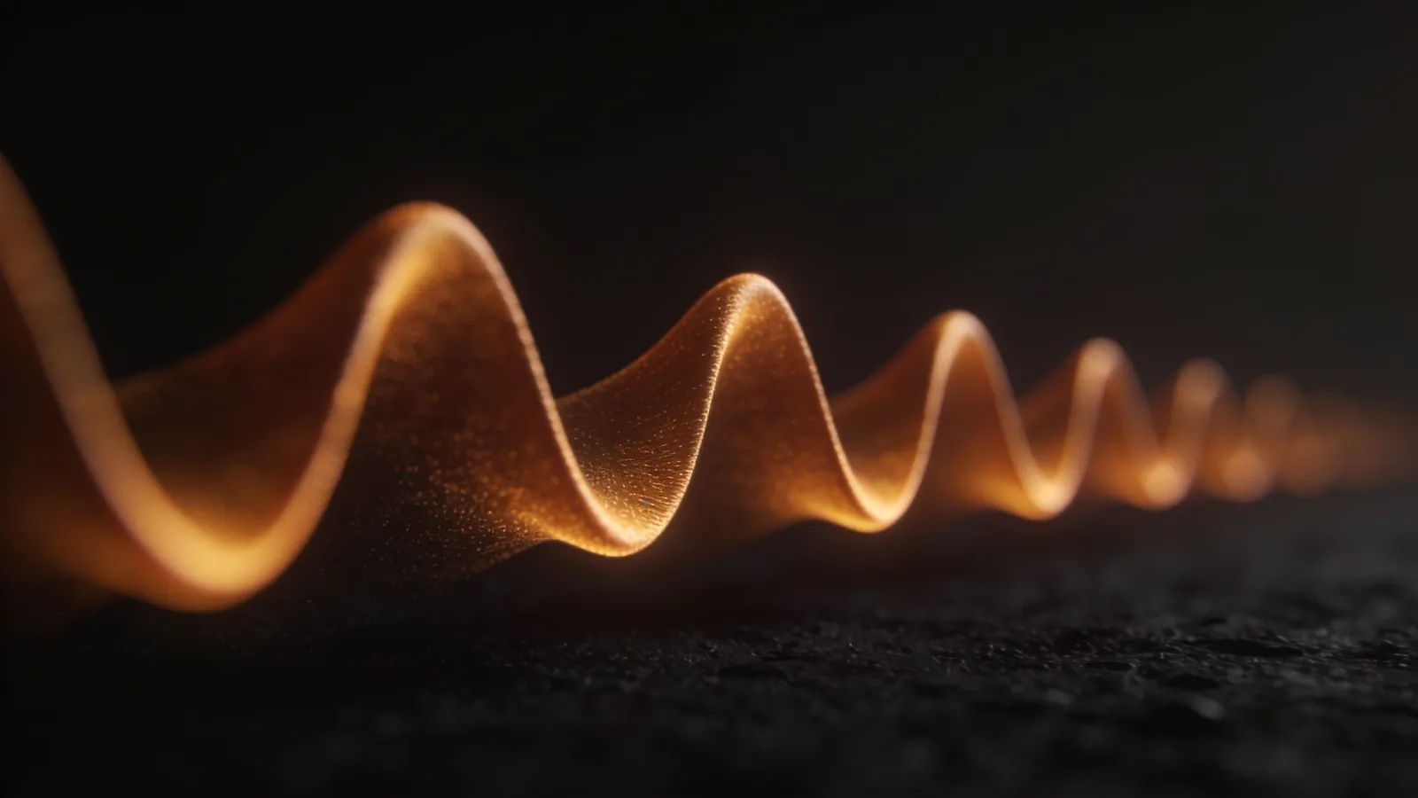 Steady amber waveform gliding across dark surface