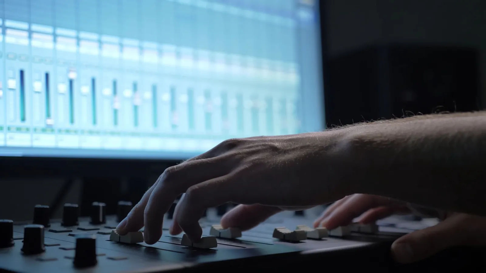 Hands at minimalist console with calm controls