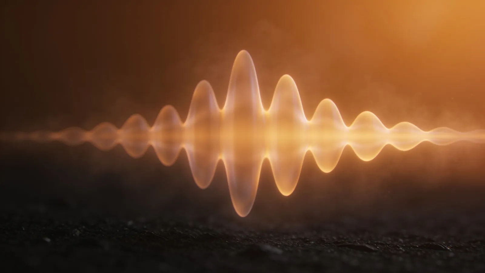Soft warm amber waveform on near-black
