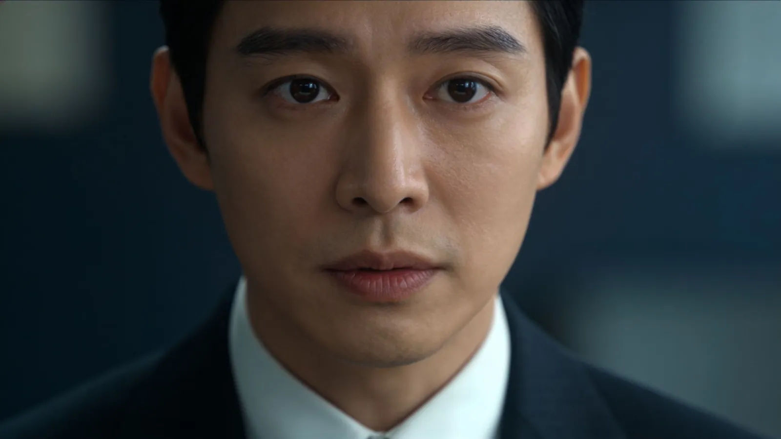 Composed professional with steady trustworthy gaze