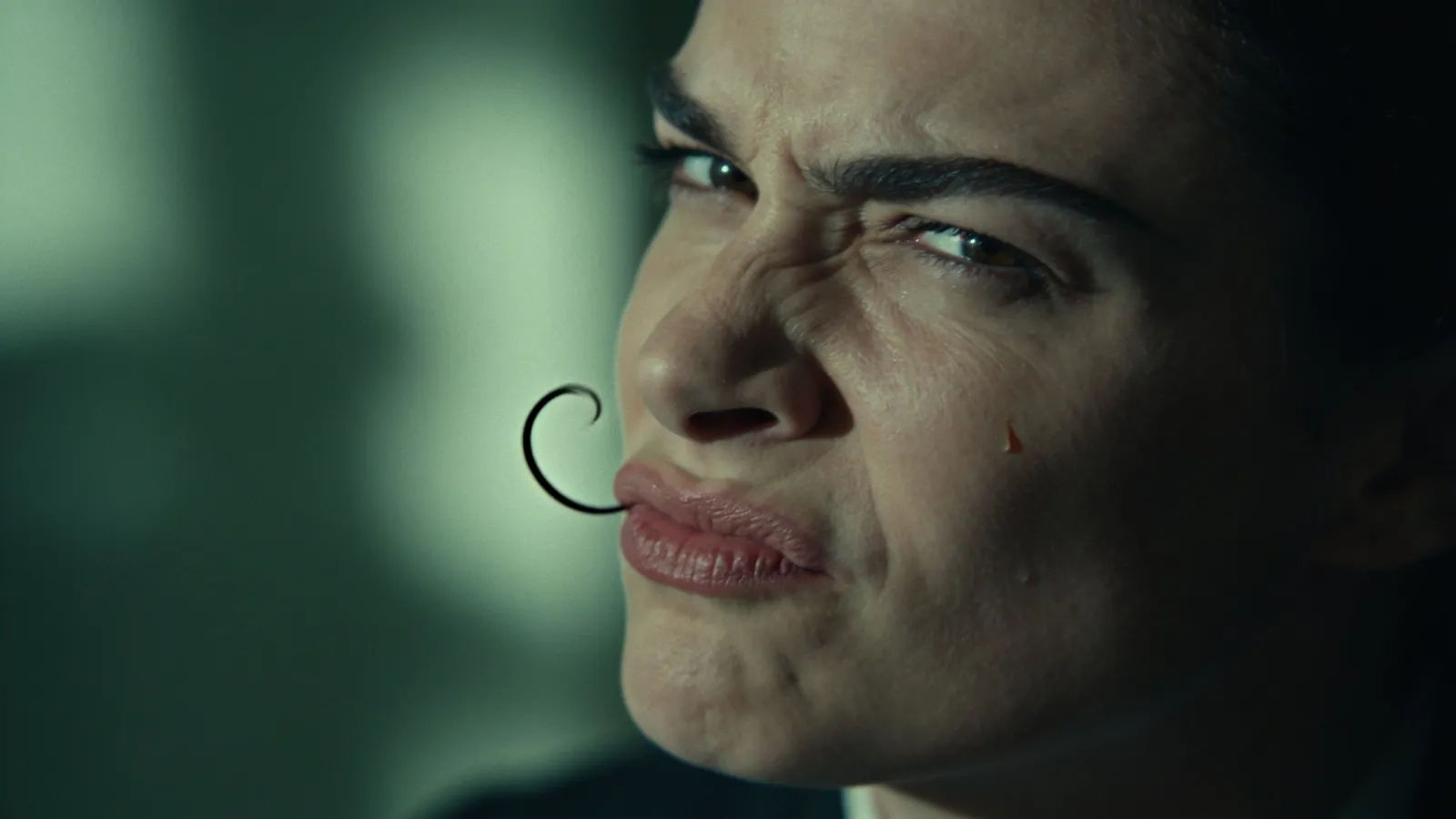 Sneering critic with curled lip of contempt