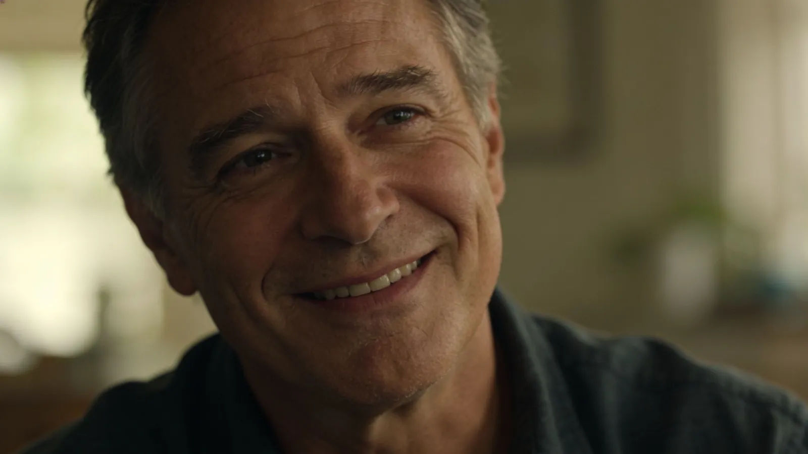 Warm friendly everyday father with relaxed smile
