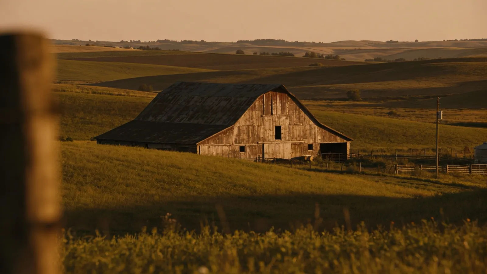 Rustic countryside farm with barn at dusk