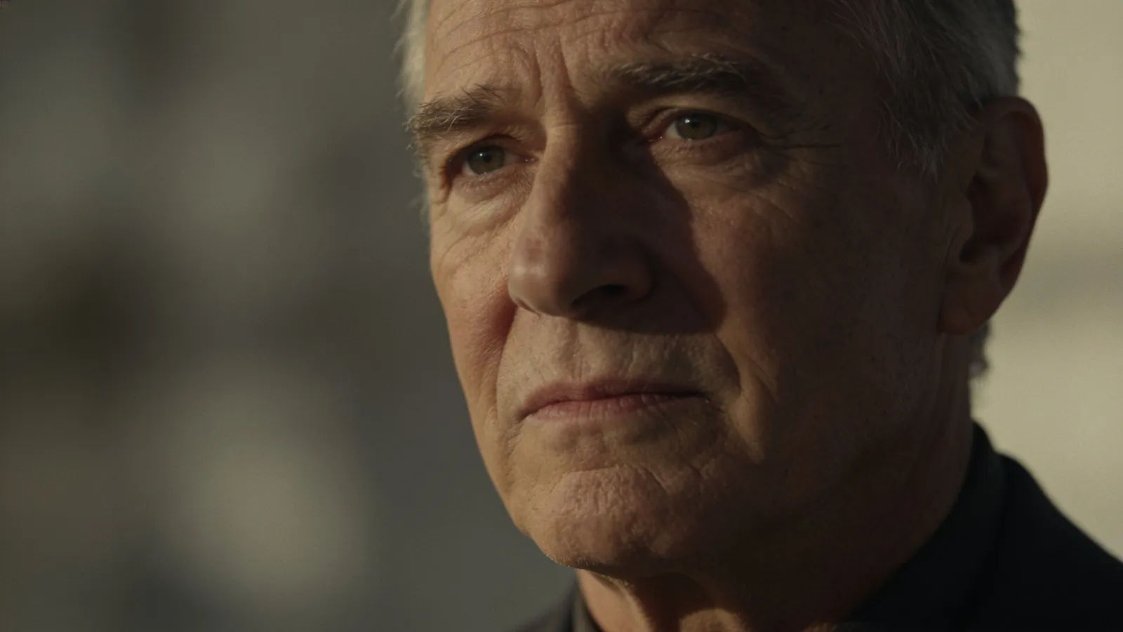 Grounded seasoned adult in dignified cinematic portrait