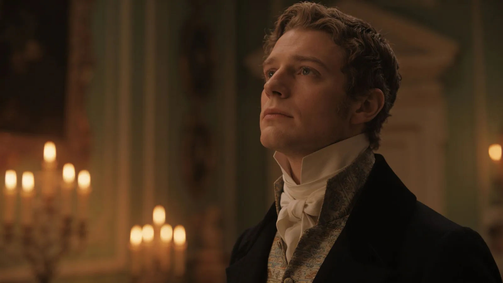 Refined aristocrat in formal attire by candlelight