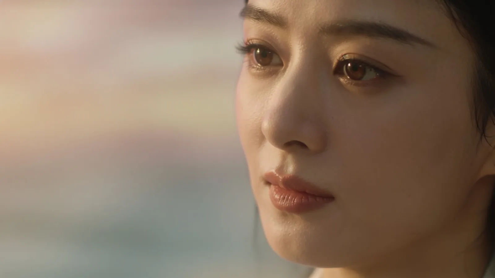 Serene person with gentle calming expression