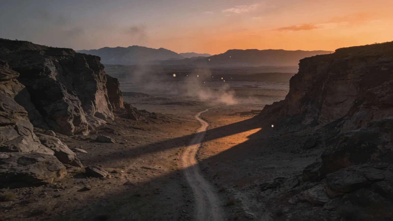 Rugged high-desert trail between bluffs at dusk