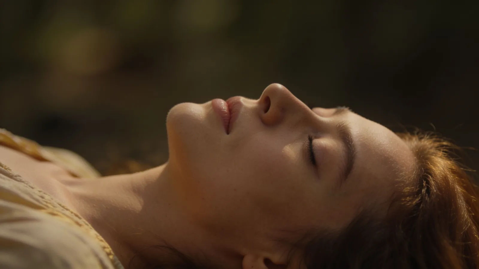 Serene person with eyes softly closed, peaceful calm