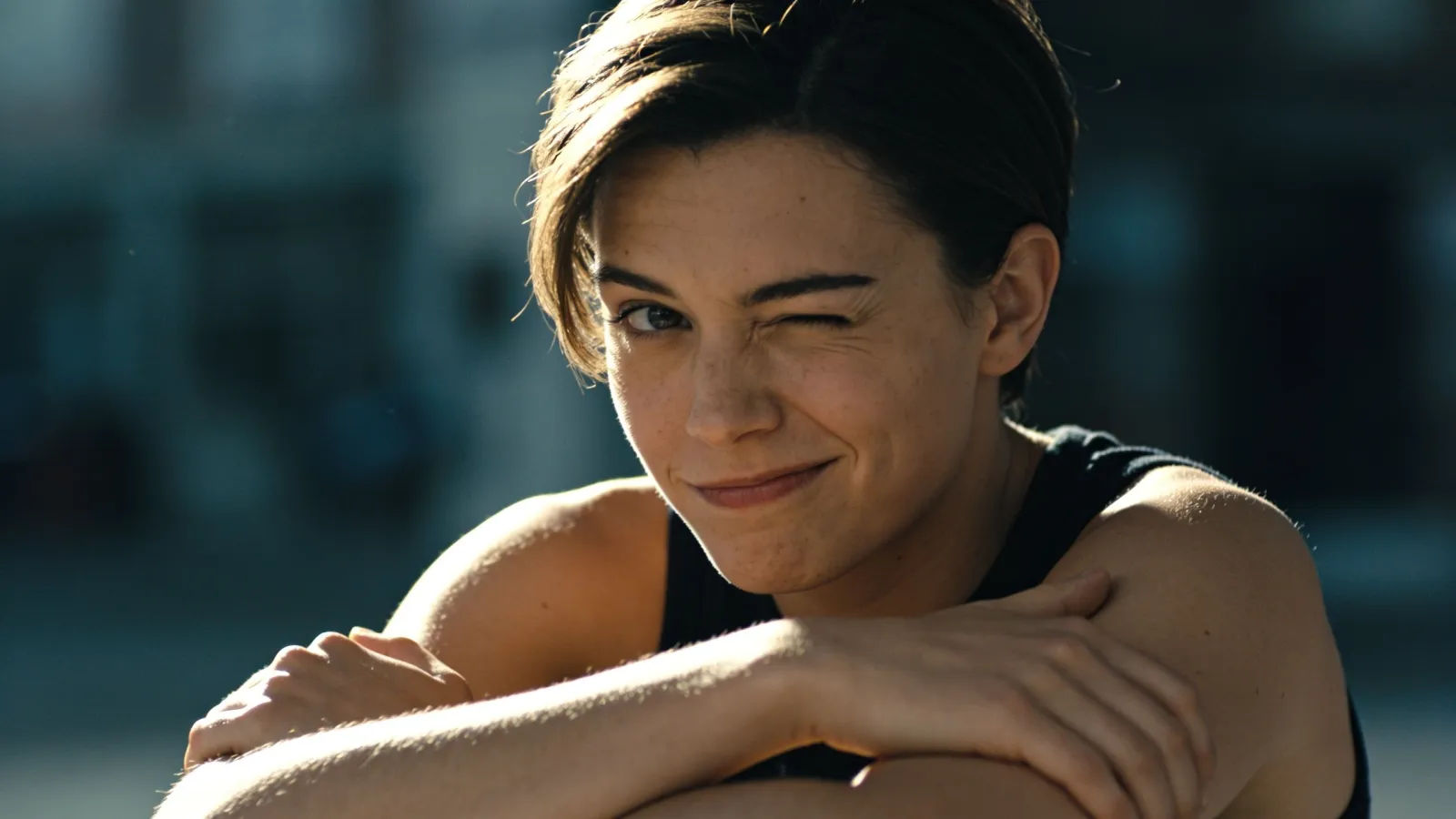 Person with a sly smug smirk