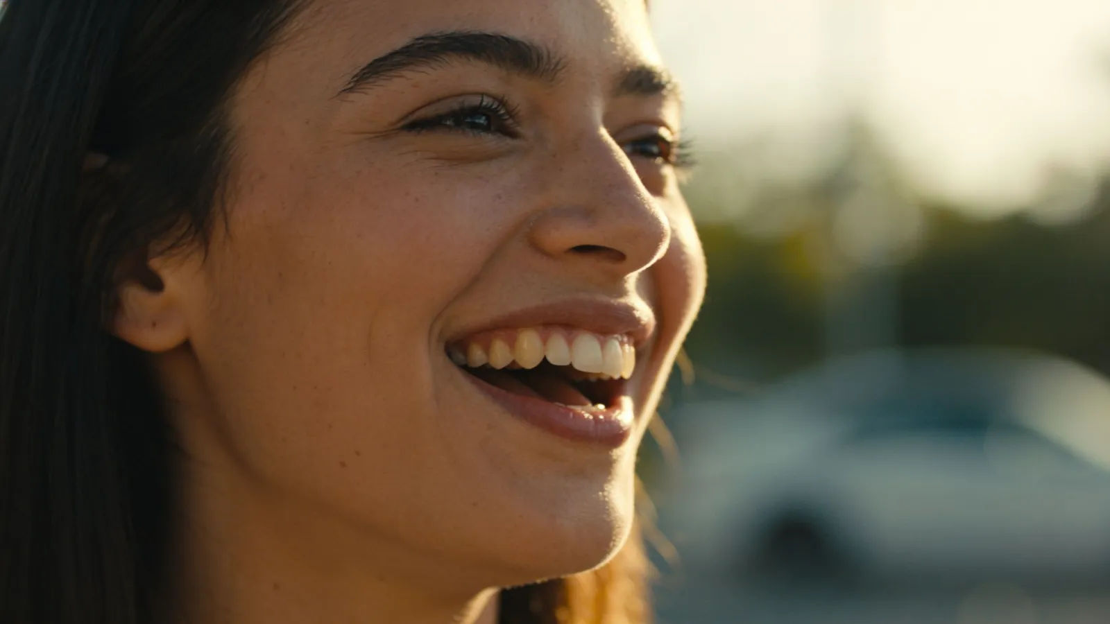 Warm person laughing with friendly expression