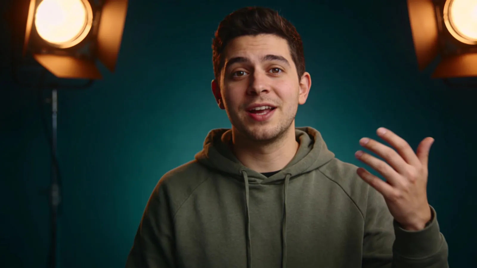 Confident young startup founder mid-pitch, cinematic portrait
