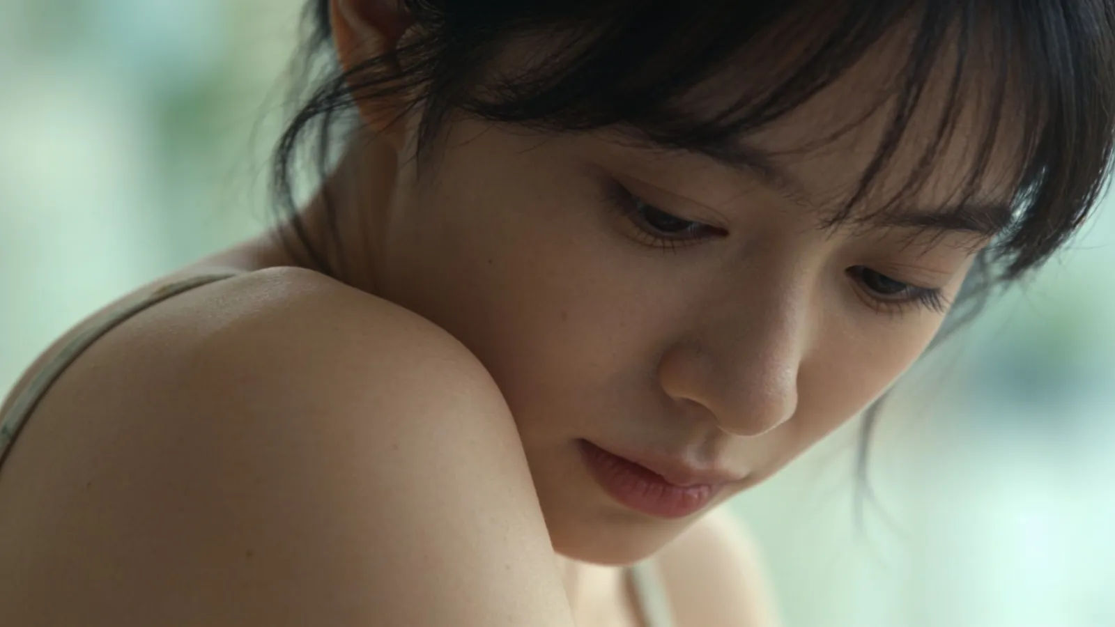 Shy person looking down shoulders drawn in