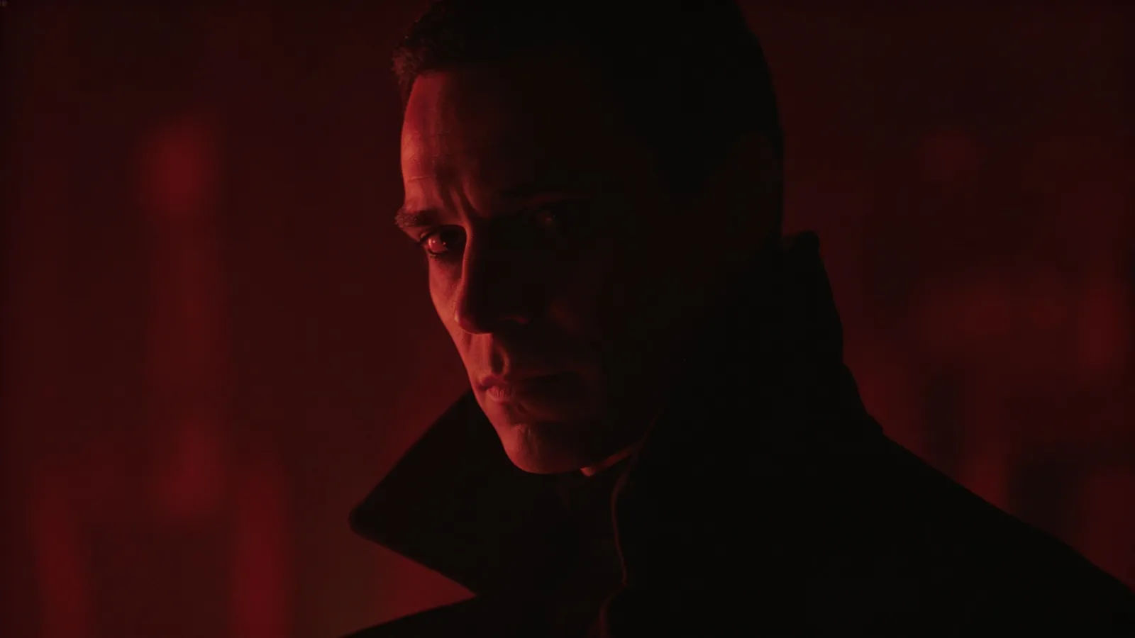 Generic menacing antagonist in dramatic shadow