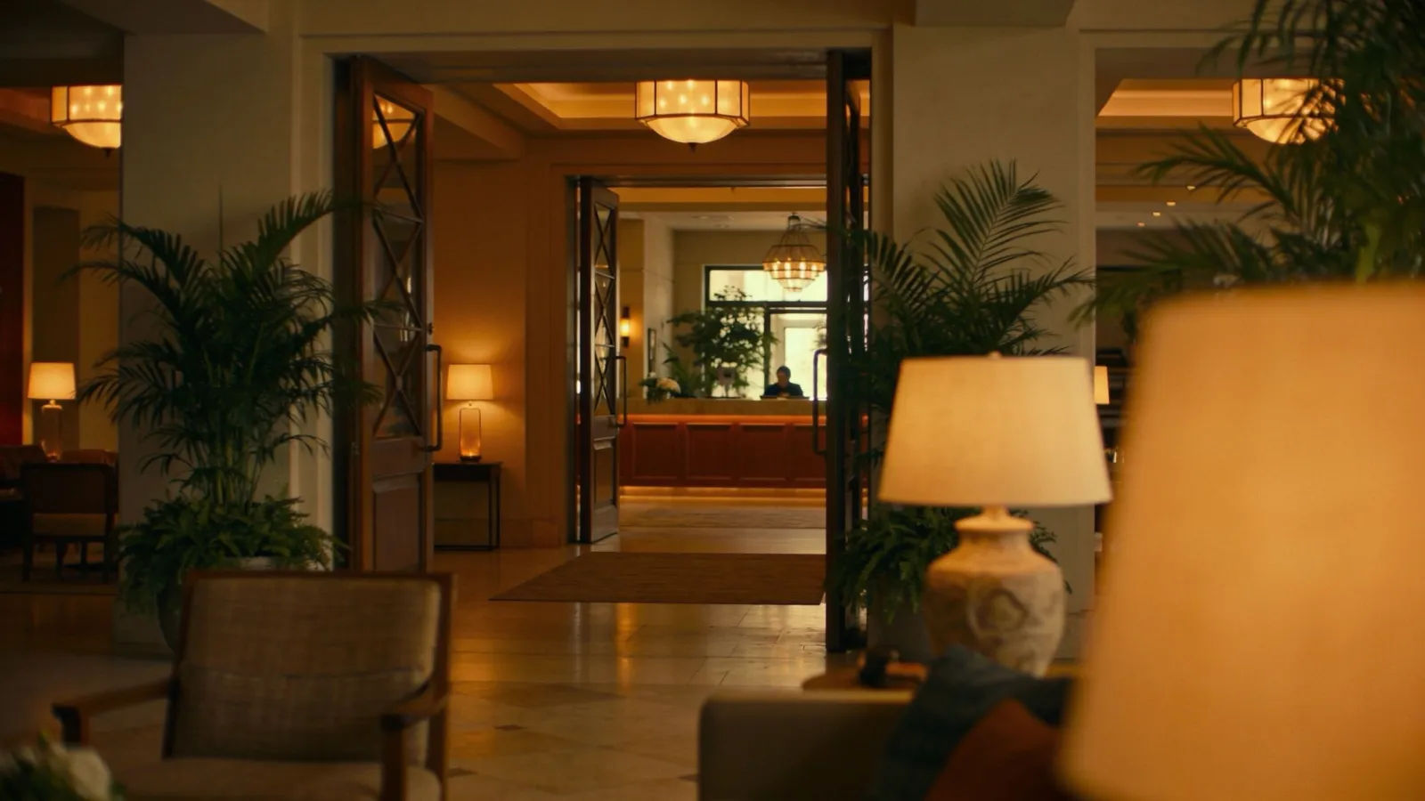 Warm inviting hospitality lobby with soft lamps