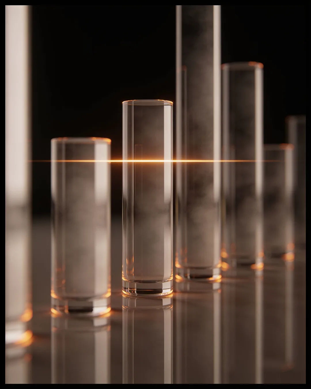 Glass columns of different heights with a glowing limit line