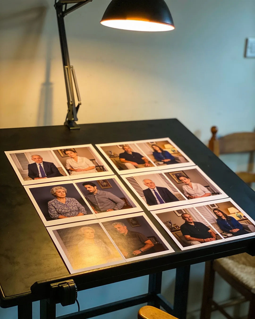 Storyboard cards of a Greek family drama laid out on a production table
