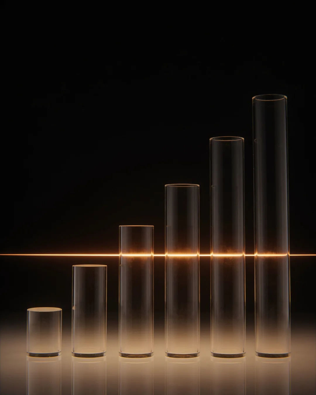 Glass columns of different heights with a glowing limit line