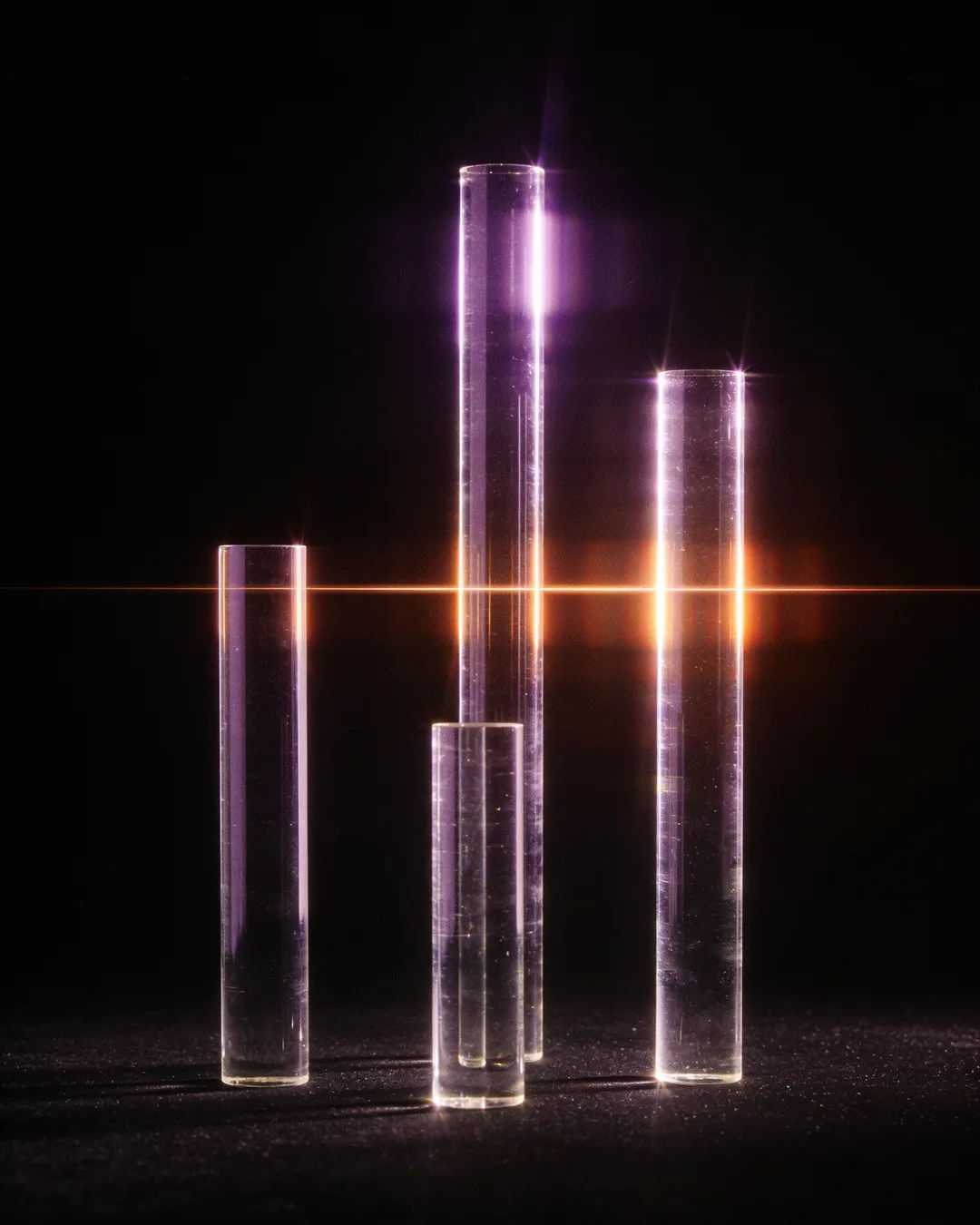 Glass columns of different heights with a glowing limit line