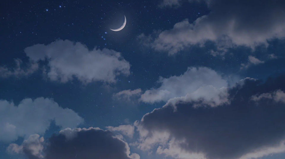 Crescent over night sky