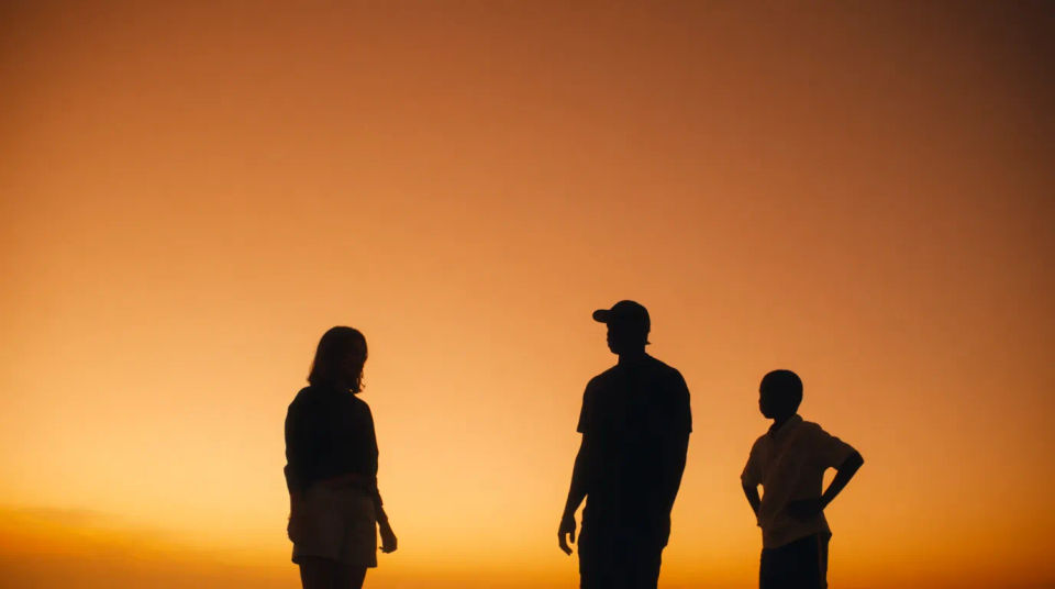 Three silhouettes sunset