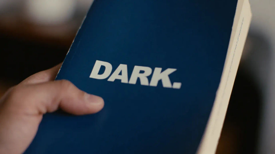 Printed paperback in hand