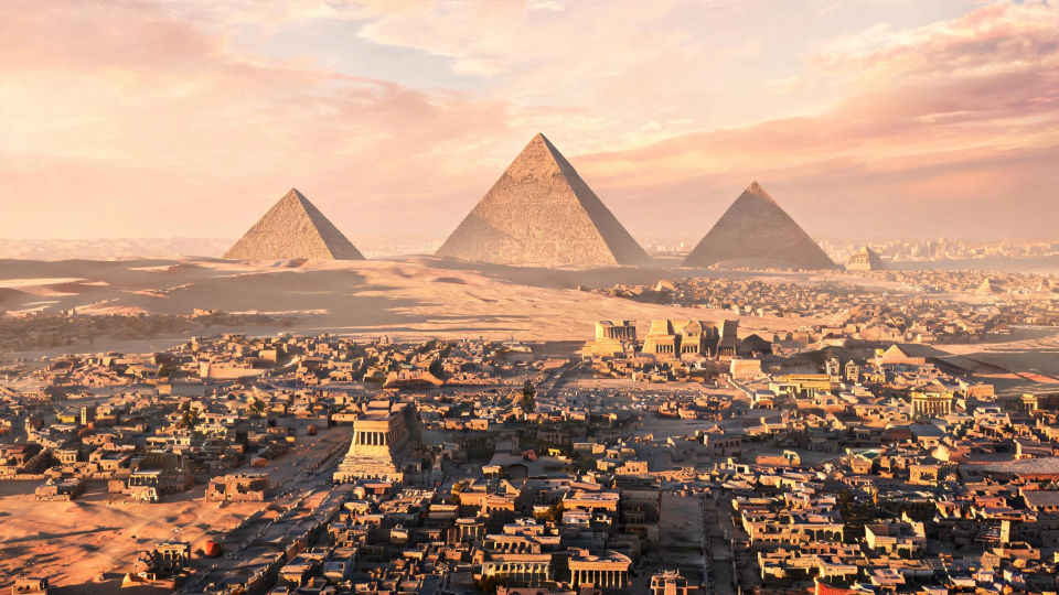 Pyramids over the city at dawn