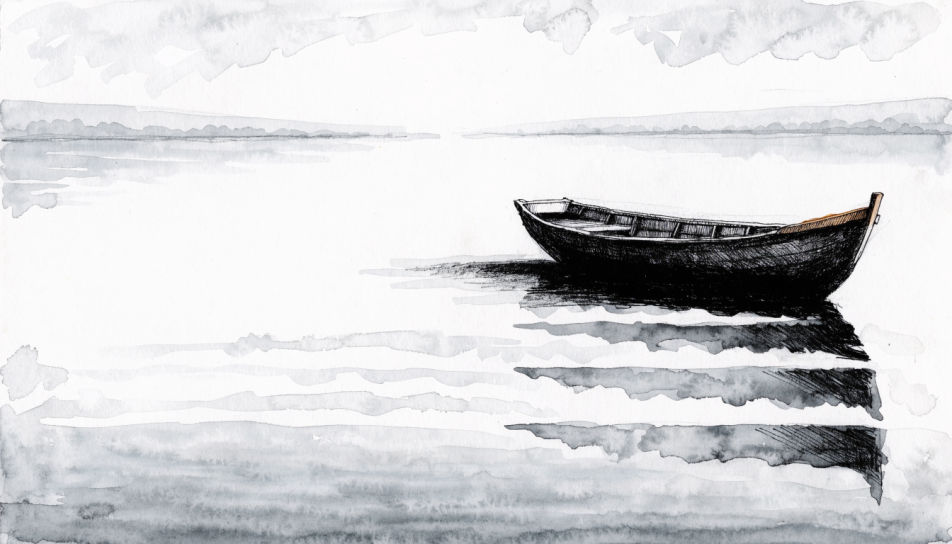 Rowing boat on a calm lake