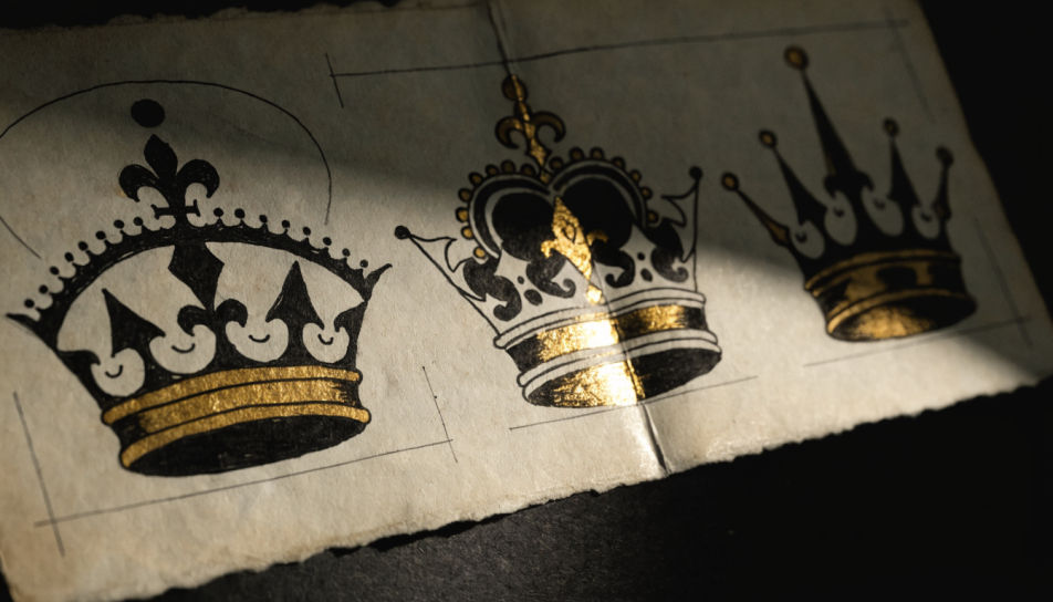 Three crowns on a flash sheet