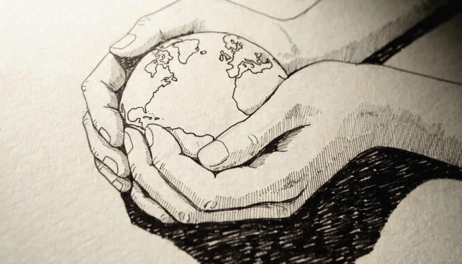 Two hands holding the earth