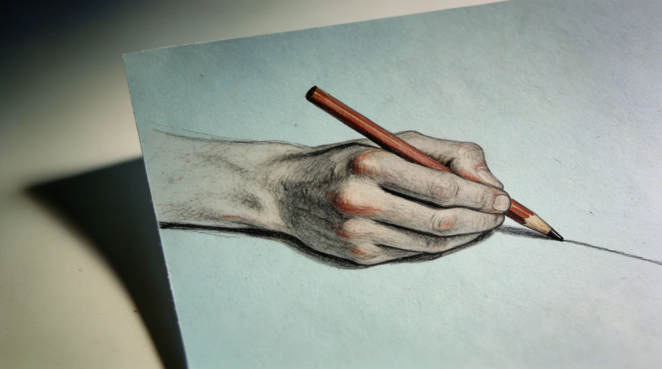 Hand holding a pencil