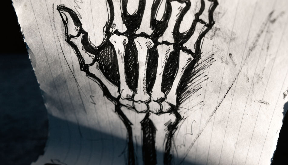 Skeleton hand reaching up
