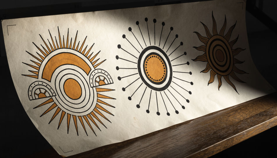 Sun on a tattoo flash sheet
