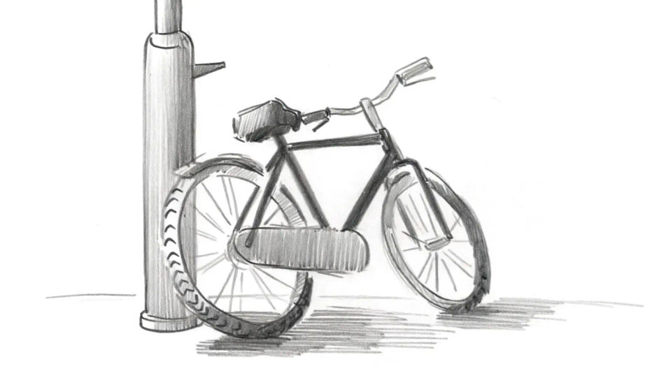 Bike leaning on a lamp post