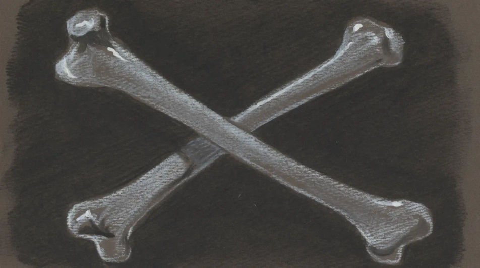 Crossed bones on dark paper