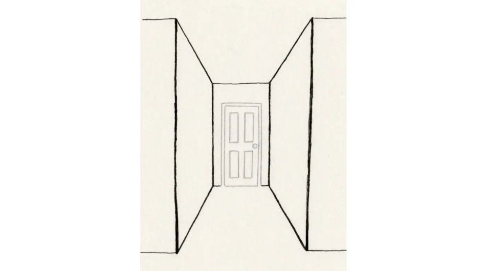 Door at the end of a corridor