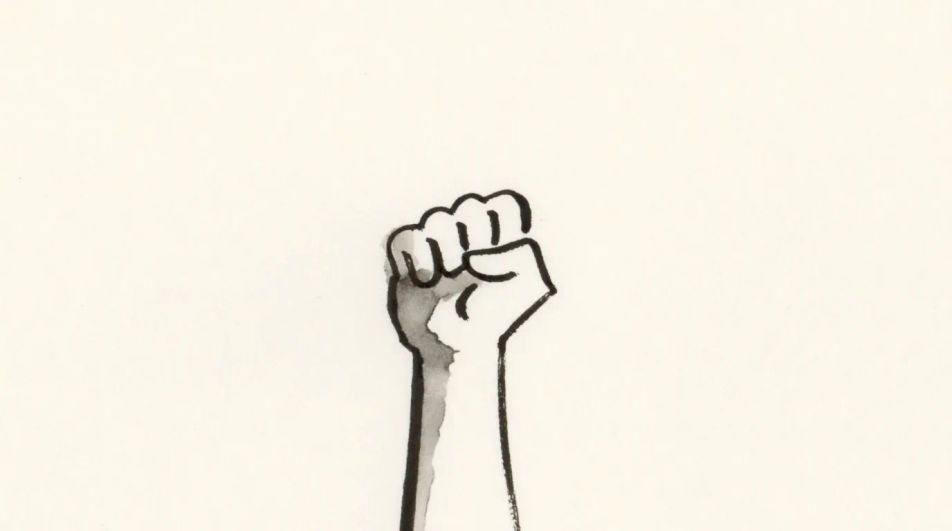 Fist raised against an open sky