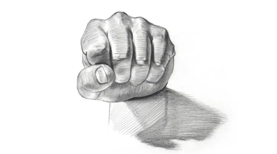 Fist resting on a table