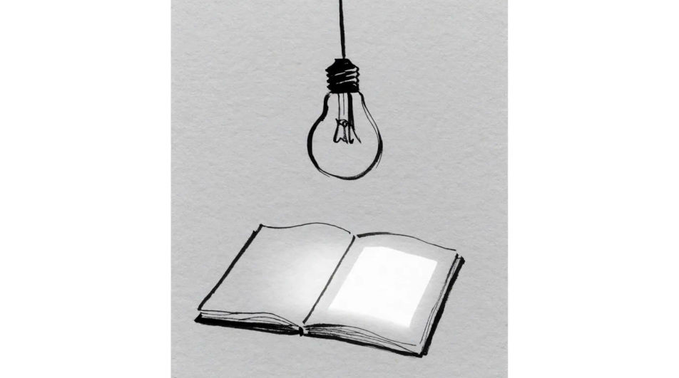 Lightbulb over an open notebook