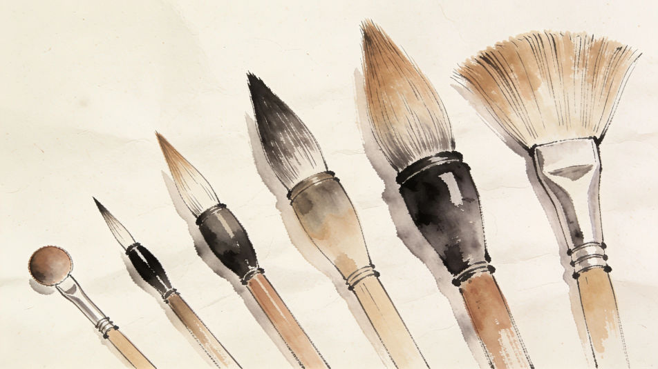 Brushes laid out by size